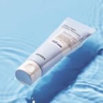 COSRX Ultra-Light Invisible Sunscreen tube displaying clear weightless daily UV protection formula
